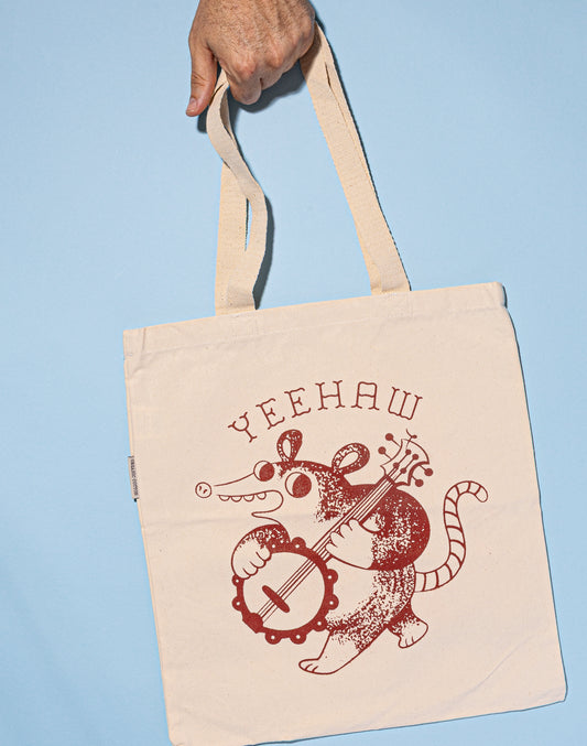 Yeehaw banjo possum tote bag