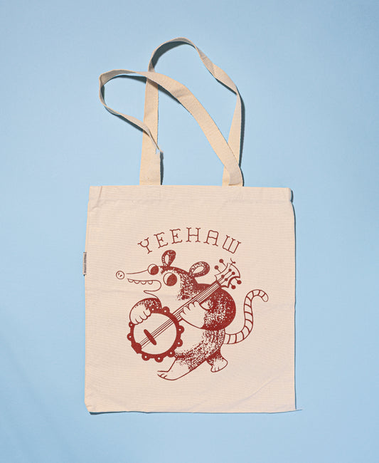 Yeehaw banjo possum tote bag